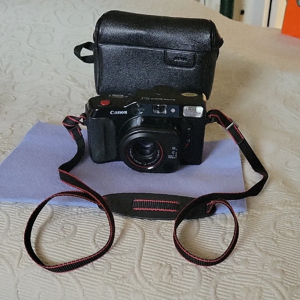 Canon Vintage Black Film Camera with Red Accents
